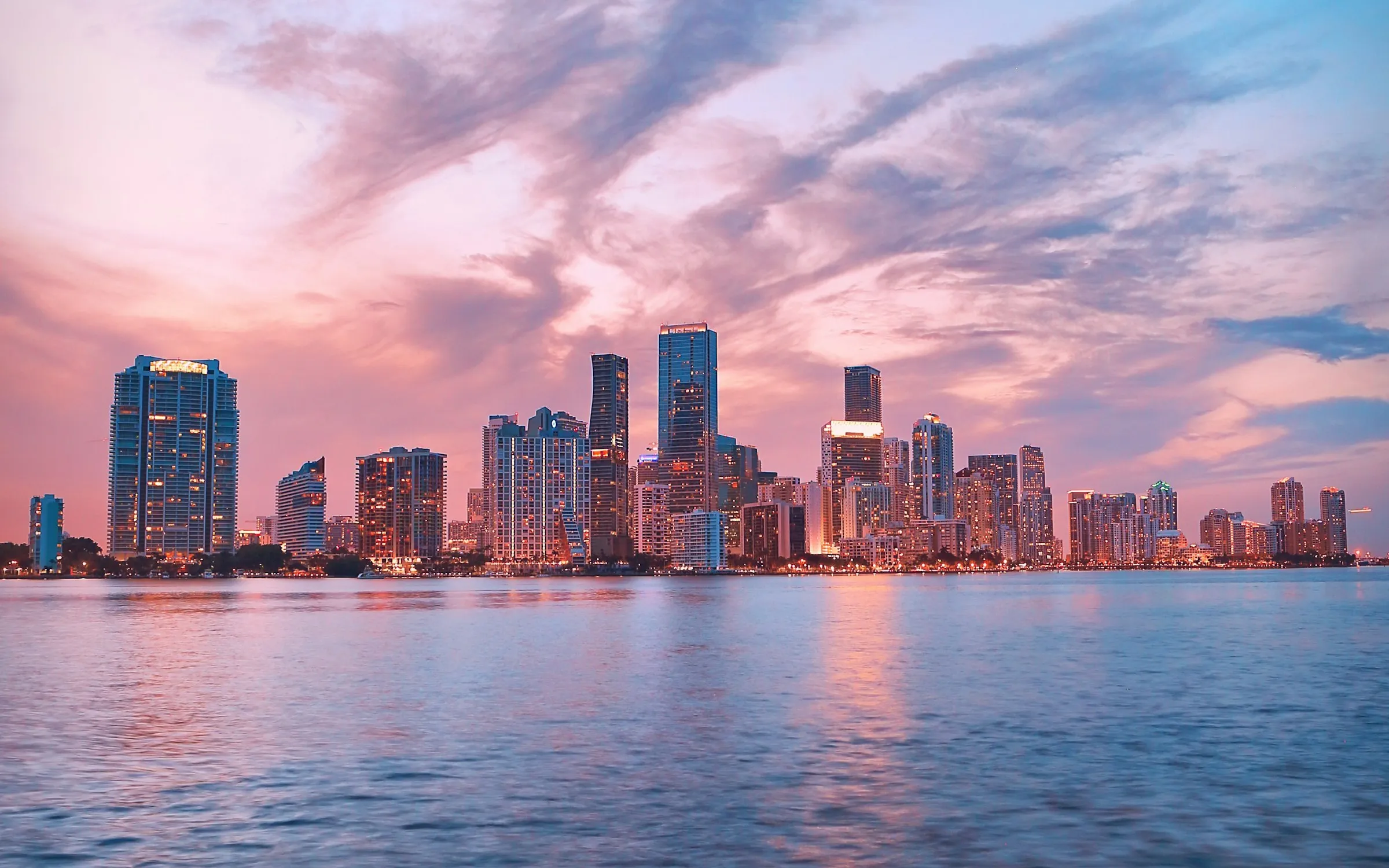 Miami skyline and coastline at dusk